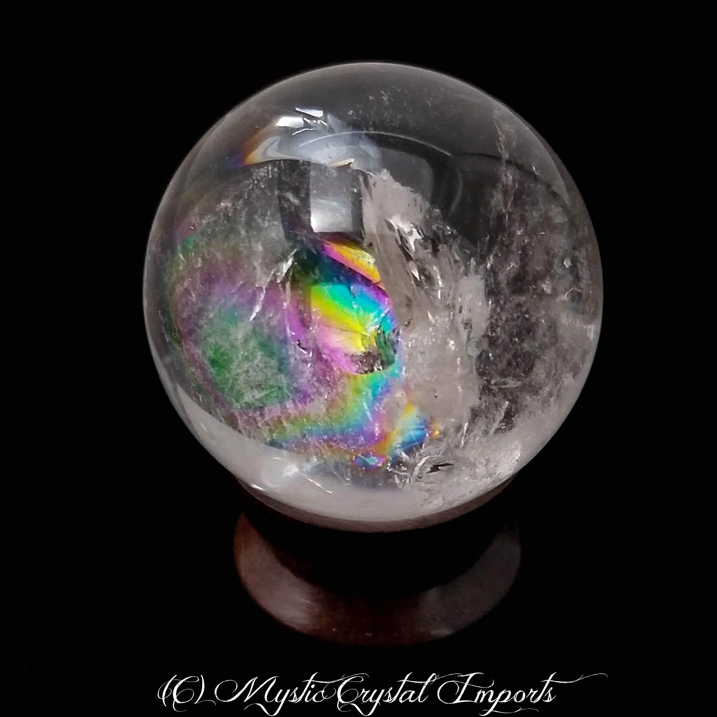 48mm Clear Quartz Crystal Sphere by Mystic Crystal Imports - Super Clear With Rainbows Inside